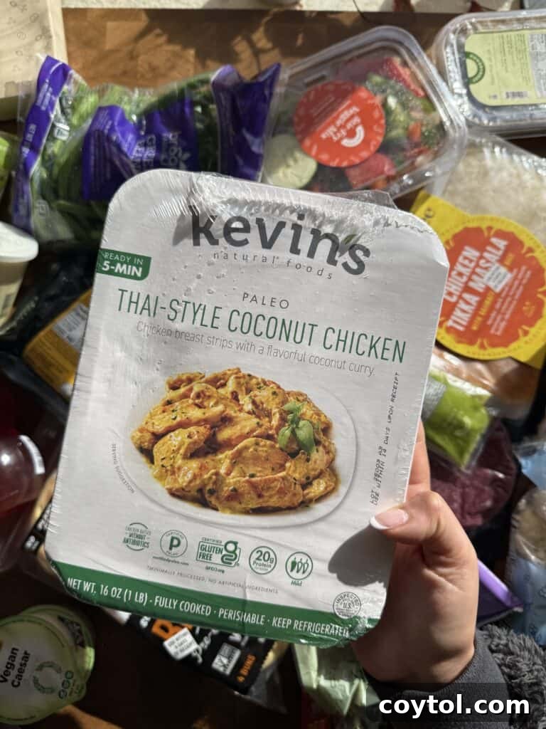 Thai-style coconut chicken, perfectly portioned in a convenient container, ready for a quick and healthy meal.