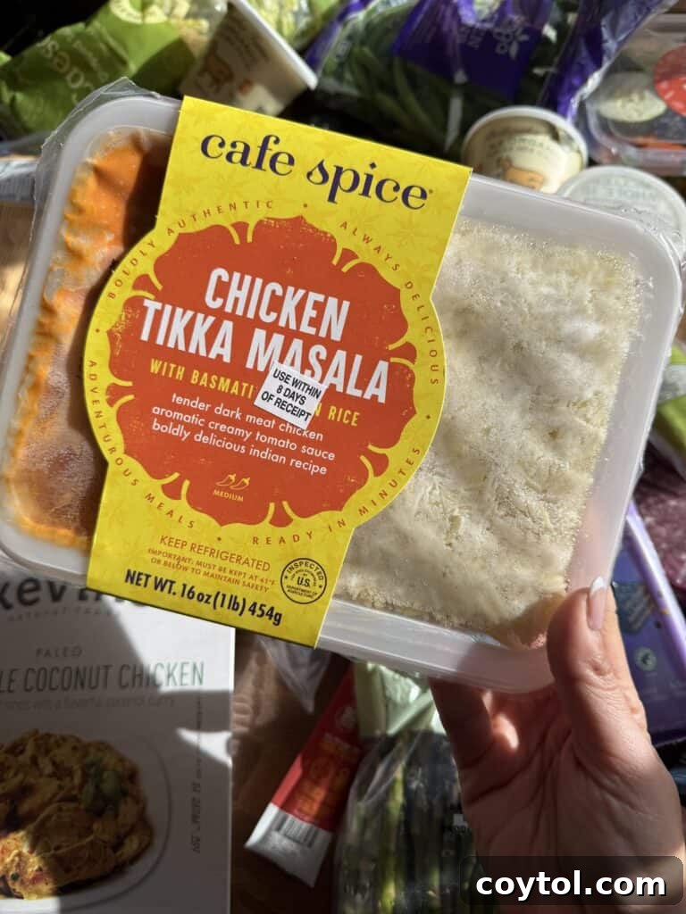 A vibrant Chicken Tikka Masala meal, prepped and packaged in a container, highlighting the convenience of Hungryroot.