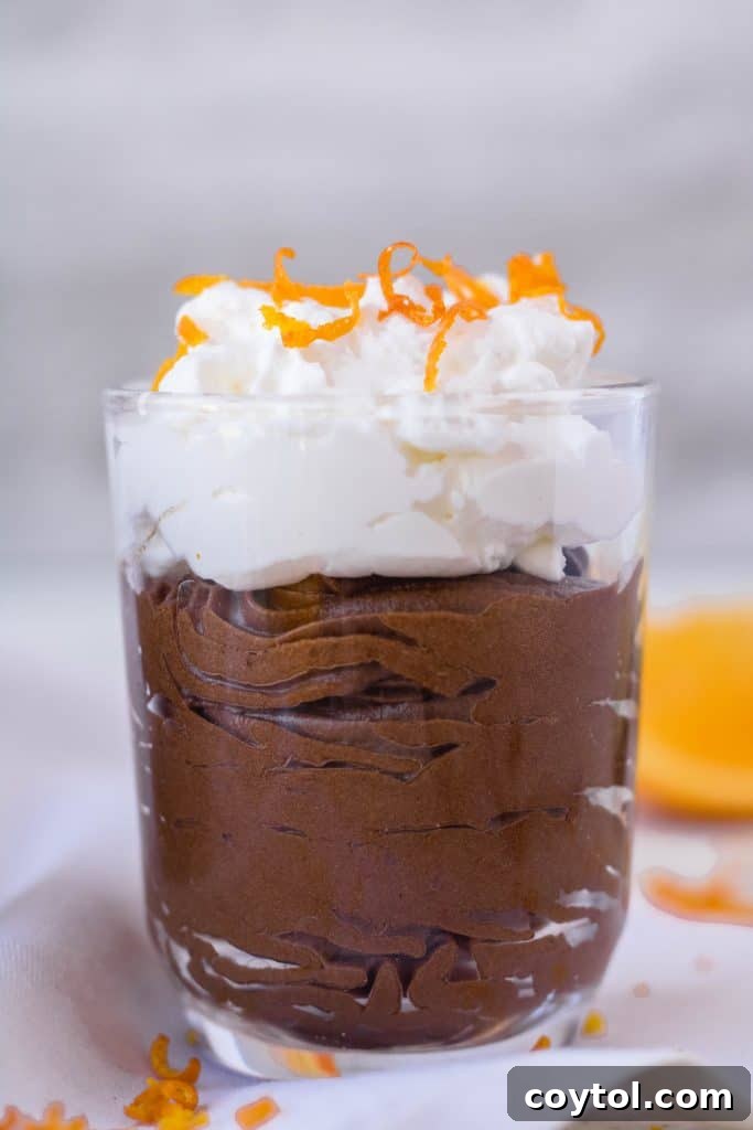 mini glass container with chocolate avocado orange mousse