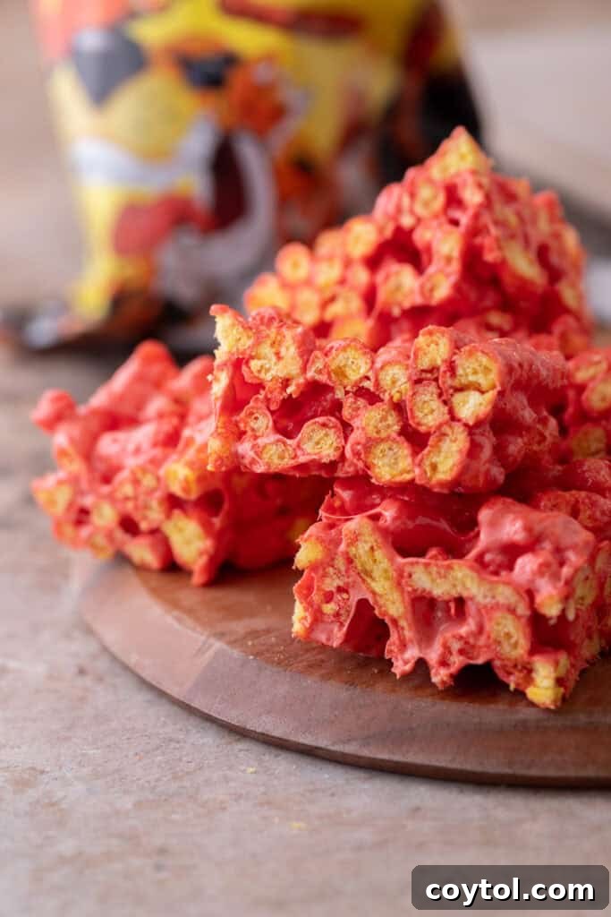 Overhead shot of Hot Cheetos Marshmallow Crispy Treats, arranged on a surface