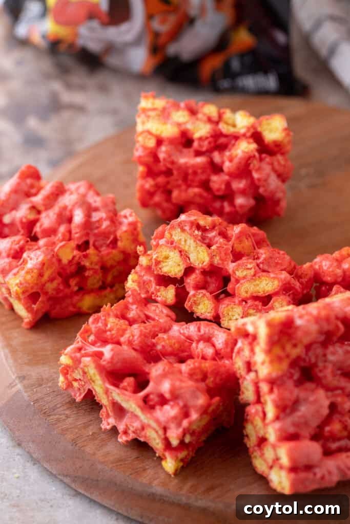 Overhead shot of Hot Cheetos Marshmallow Crispy Treats, showing their vibrant red hue