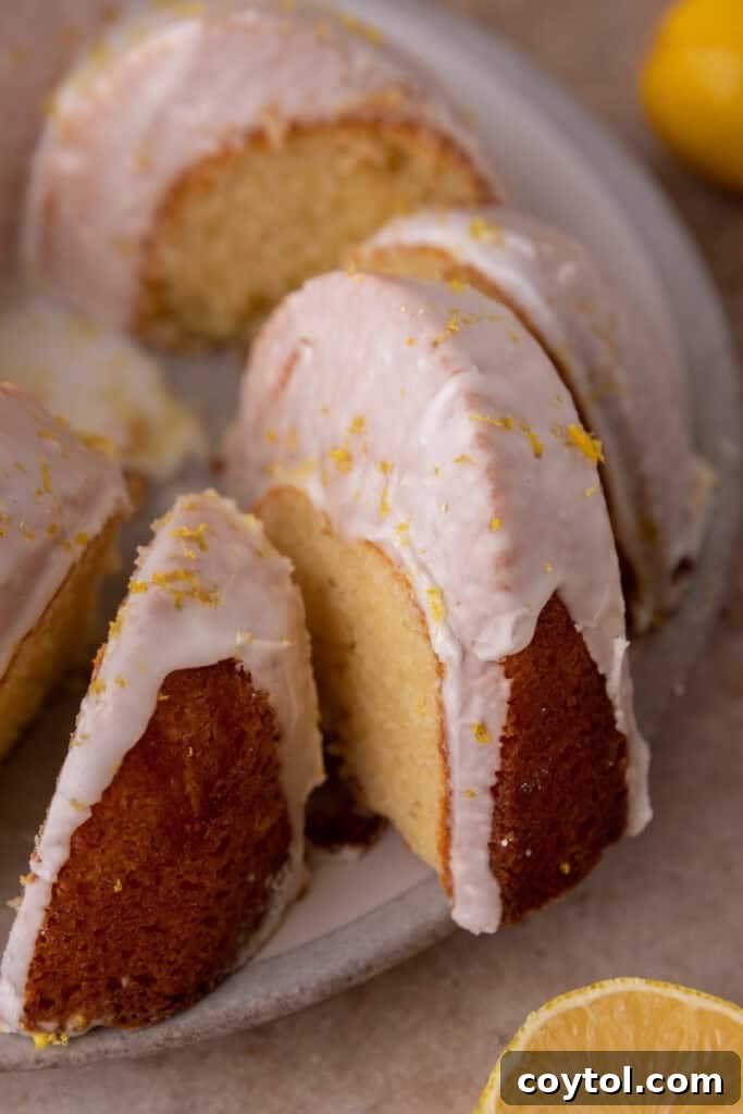 Zesty & Moist Lemon Bundt Perfection 20 A closer overhead view of the lemon bundt cake slices, highlighting the glaze and texture for serving.