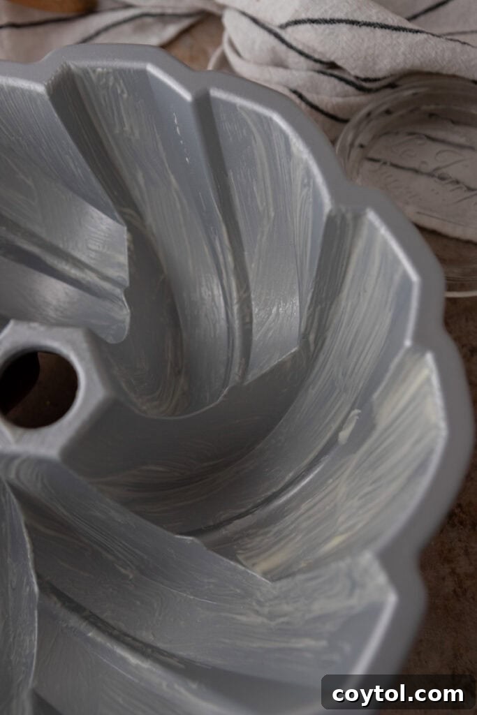 A Bundt cake pan coated with homemade cake release, ready for batter