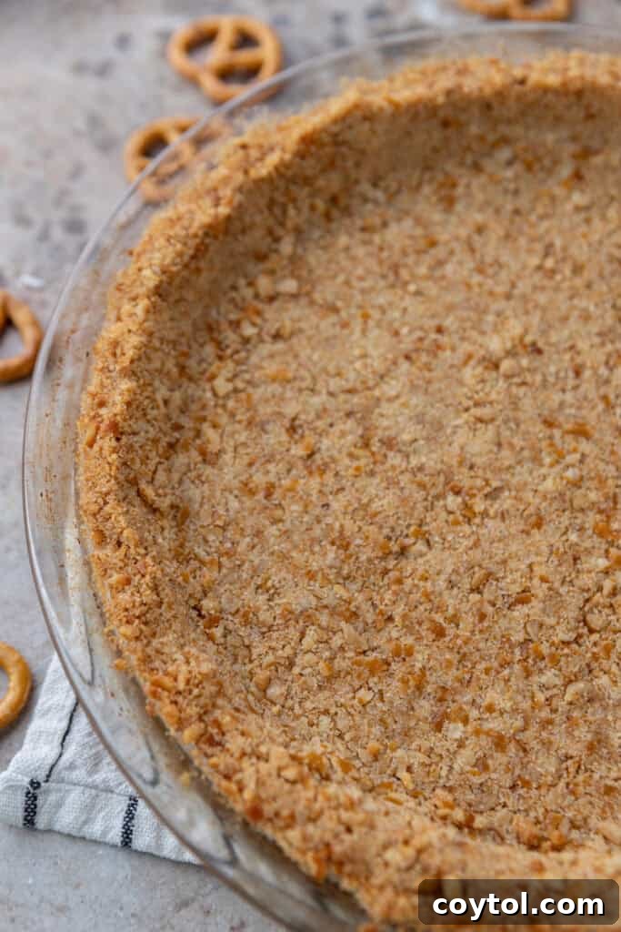 The Ultimate Salty Sweet Pretzel Pie Crust 10 Beautifully textured pretzel pie crust, ready for filling, showcasing its unique appeal.