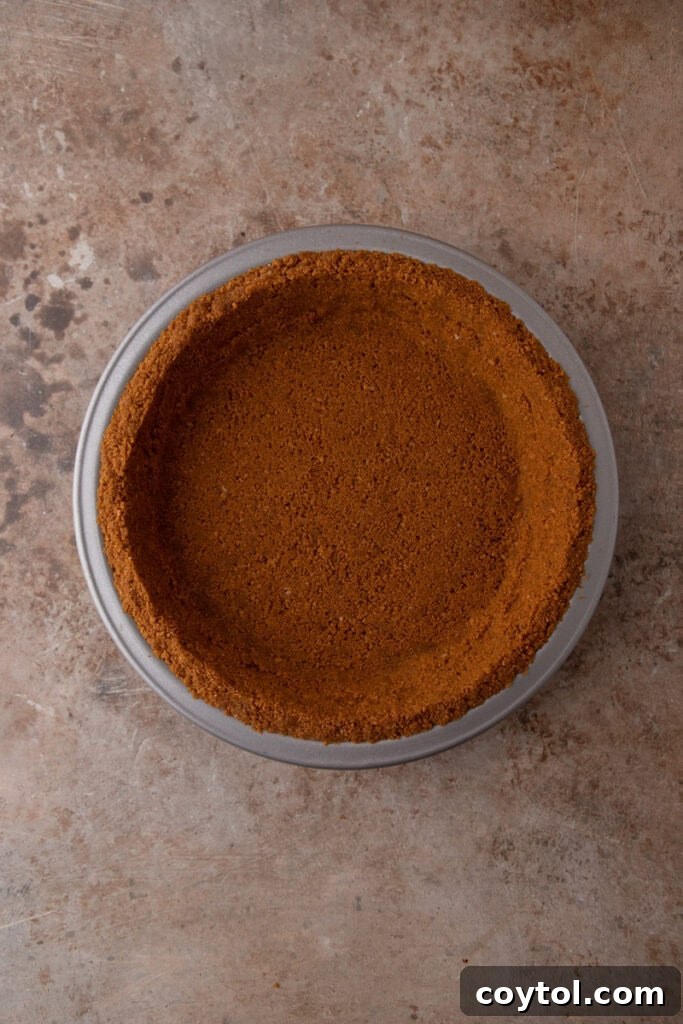 Unlock the Secret to the Perfect Biscoff Pie Crust 10 A finished, evenly pressed Biscoff pie crust in a pie plate, ready for chilling or baking.