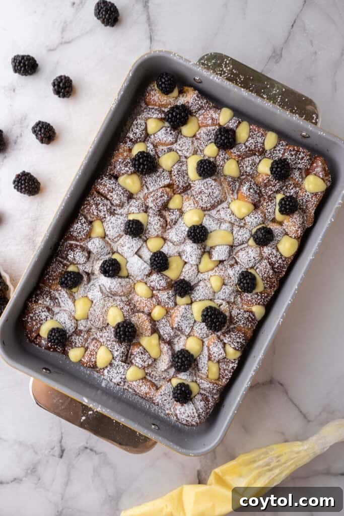 Pretzel Crusted French Toast Casserole 10 cooked bread pieces with custard poured over it