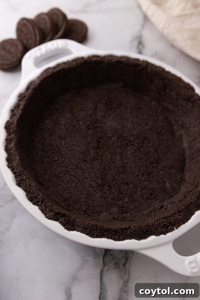 Oreo Pie Crust Recipe overhead shot showing a finished crust in a pie dish