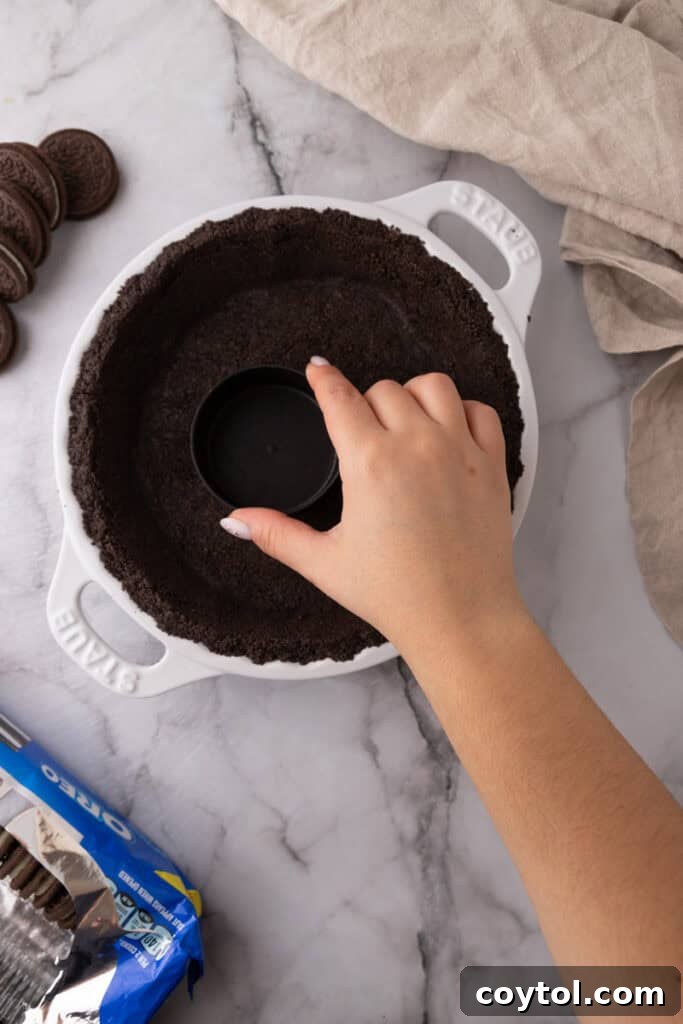 Finished Oreo pie crust in a dish