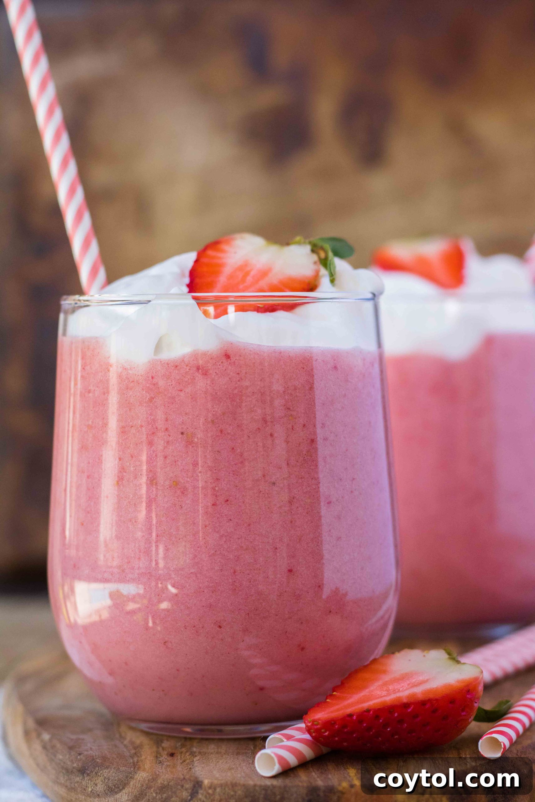 Banana strawberry smoothie recipe with yogurt and fresh garnishes