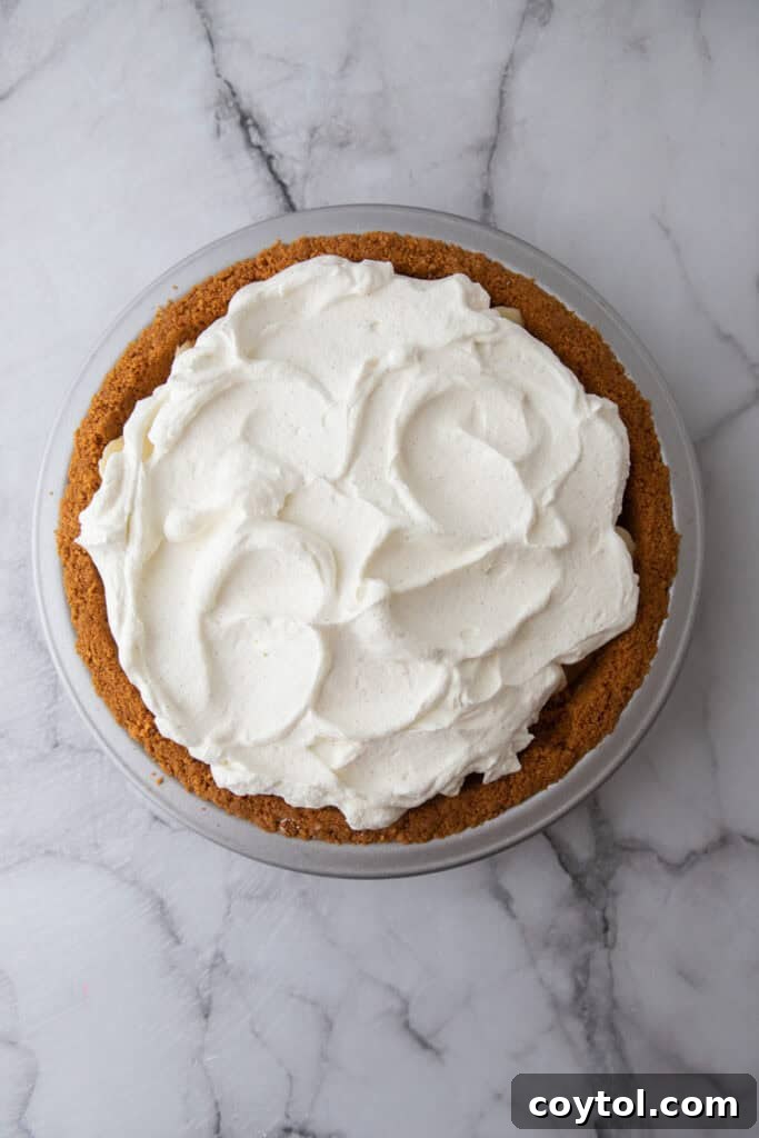The Secret To Divine Banoffee Pie 12 whipped cream on top of other ingredients