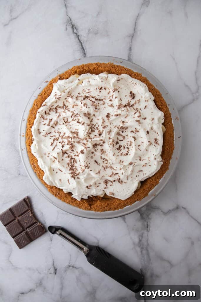 The Secret To Divine Banoffee Pie 13 whipped cream and chocolate on top of other ingredients