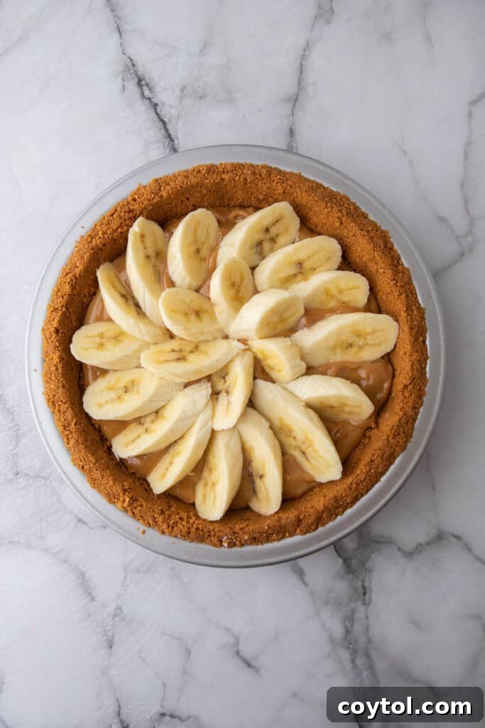 The Secret To Divine Banoffee Pie 8 banana slices on the dulce de leche