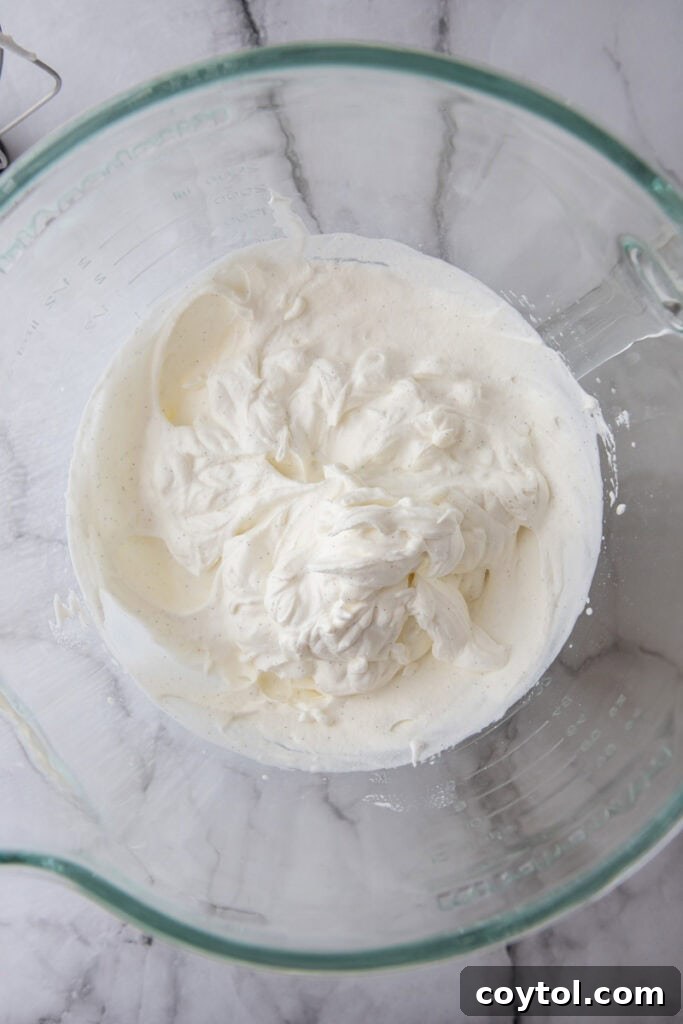 The Secret To Divine Banoffee Pie 9 cream getting whipped in a bowl