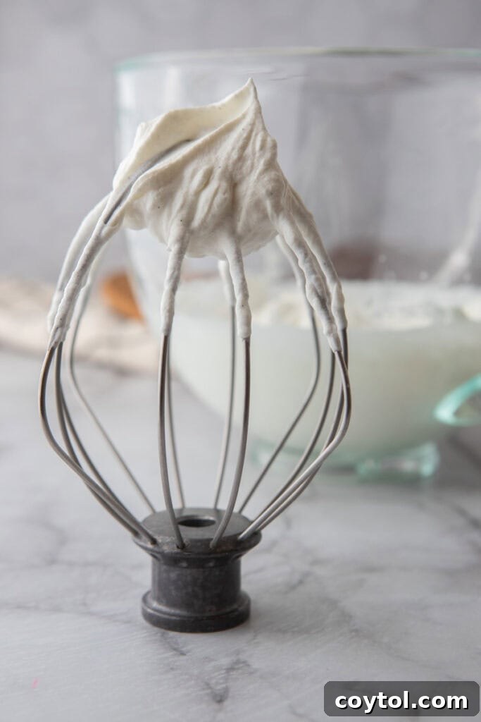The Secret To Divine Banoffee Pie 10 cream getting whipped in a bowl