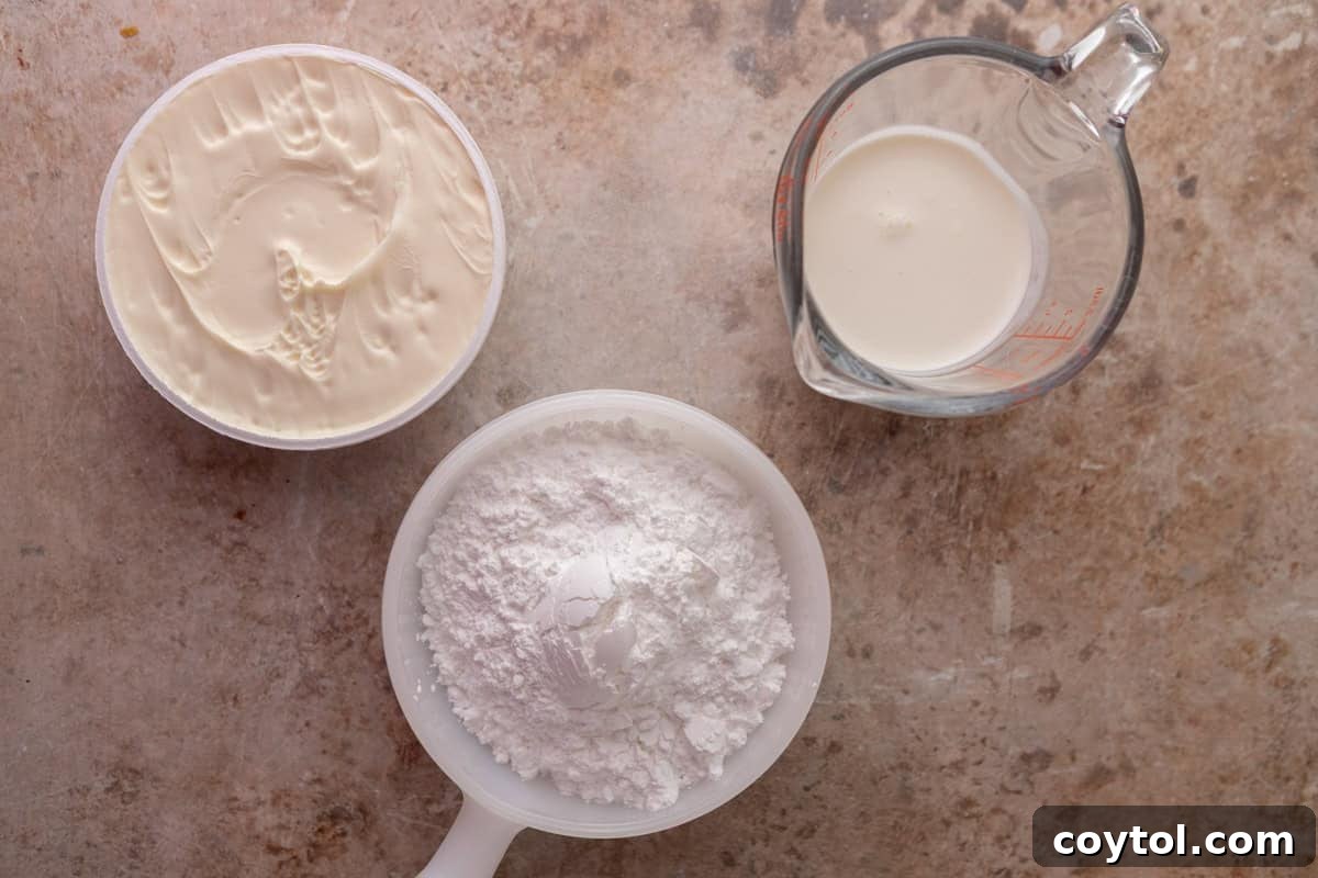 Vanilla mascarpone frosting ingredients for Black Forest cinnamon rolls