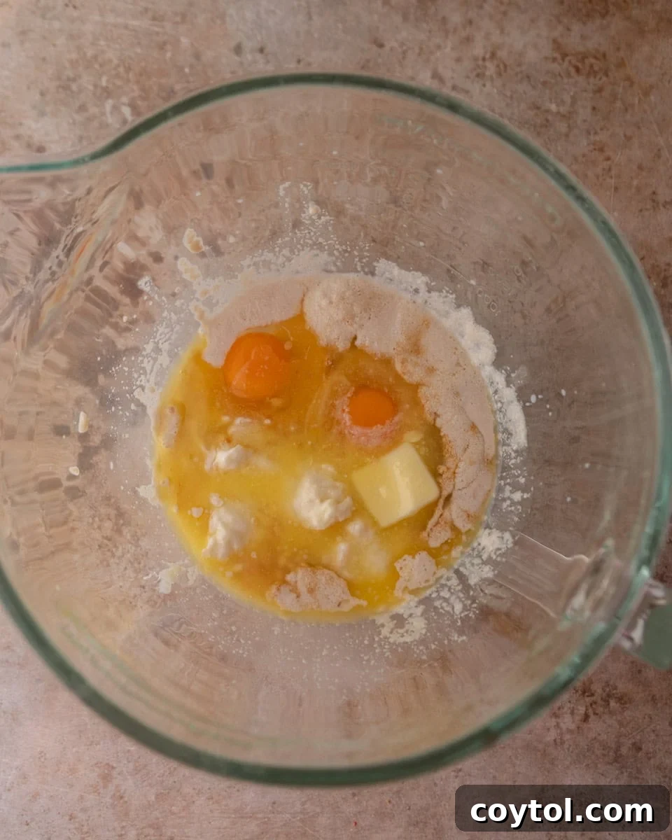 Wet ingredients in a mixing bowl before combining