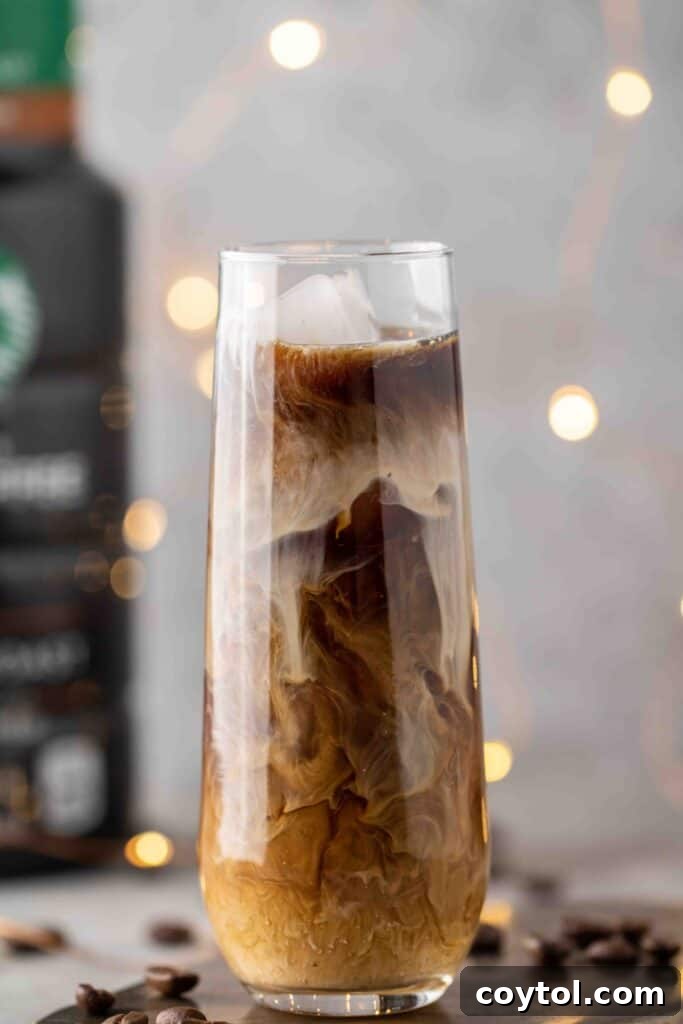 Unlock Starbucks Flavors: 65+ Beloved Recipes You Can Make 3 Homemade Starbucks Vanilla Sweet Cream Cold Brew with creamy vanilla foam