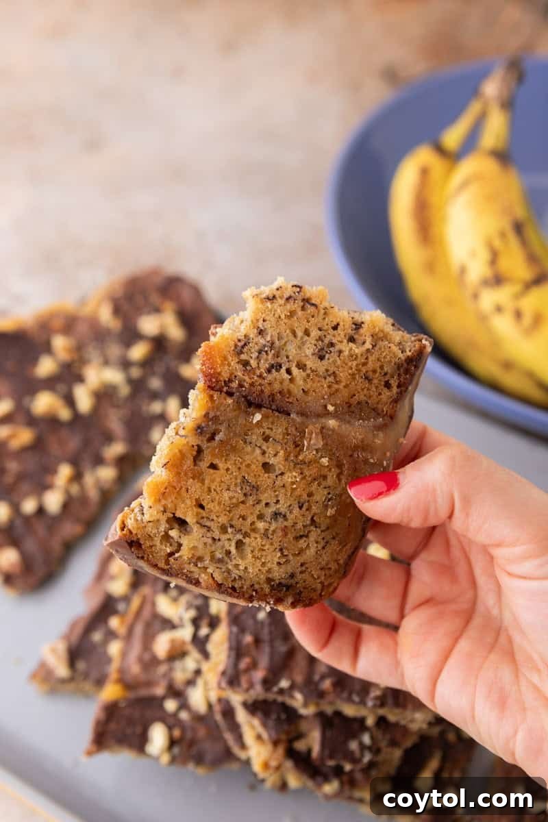 Banana bread Christmas crack flipped to show the soft banana bread base soaked with caramel.